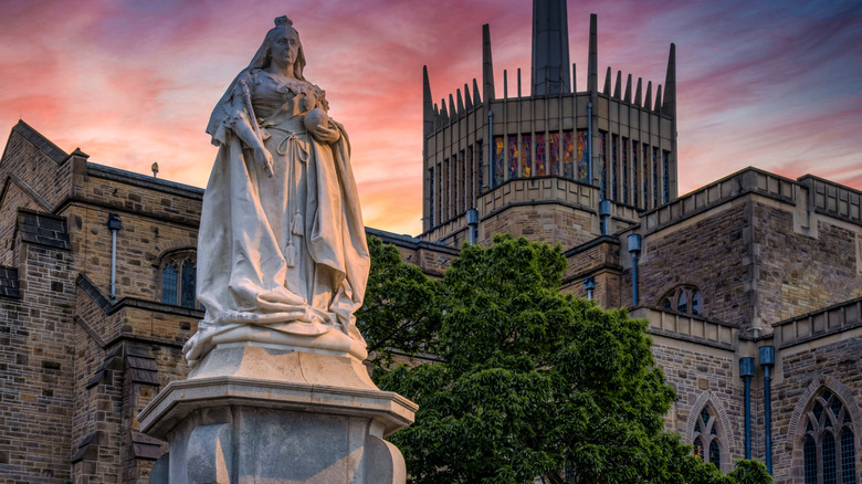 Blackburn Cathedral with Queen Victoria Statue at Sunset, in Blackburn, Lancashire, UK