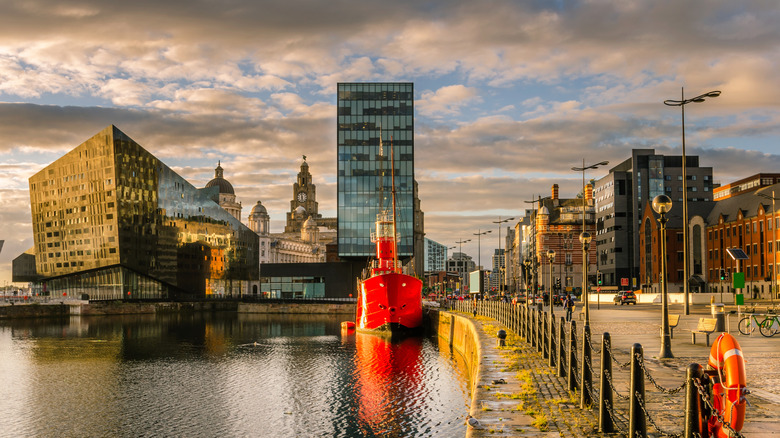 Liverpool's historic waterfront with modern and old architecture at sunset