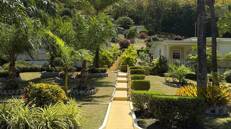 Landscaped gardens and cottage at Blue Horizons Garden Resort in Grenada