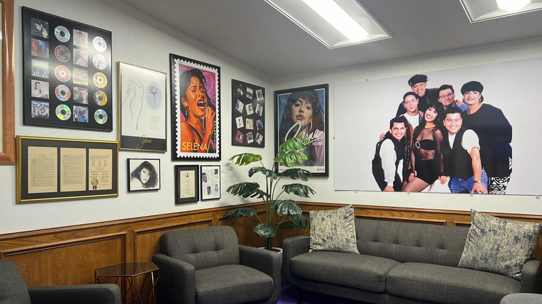 Couches, with images and memorabilia on the walls inside the Selena Museum