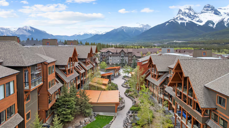 View of a community in Canmore with the Rocky Mountains in the background