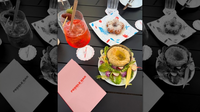 Food and drinks on the table at Pebble Bar