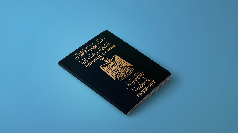 A passport for the Republic of Iraq on a blue blackground