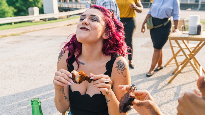 Someone really enjoying barbecue