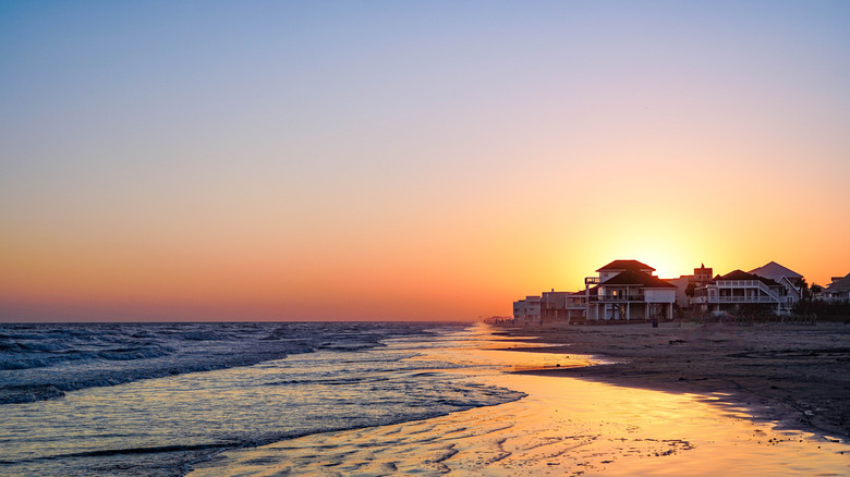 Homes on Galveston Beach at sunset