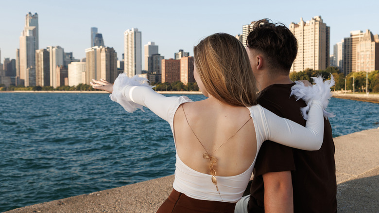 A couple enjoying the view on a beachfront in Chicago, Illinois