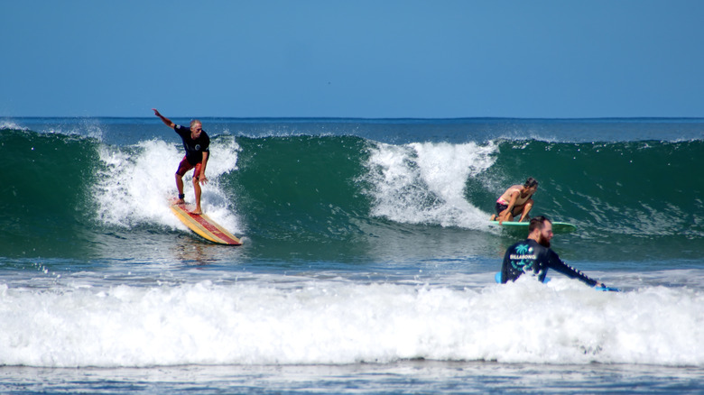 People learning how to surf in Tamarindo, Costa Rica