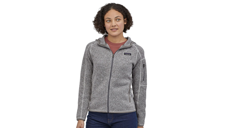 A woman modeling the Better Sweater Jacket for REI