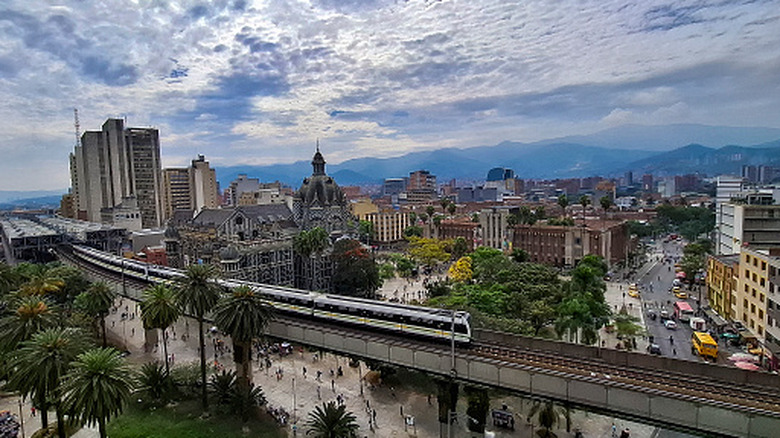 An aerial view of the city center and tram in Medellin, Colombia