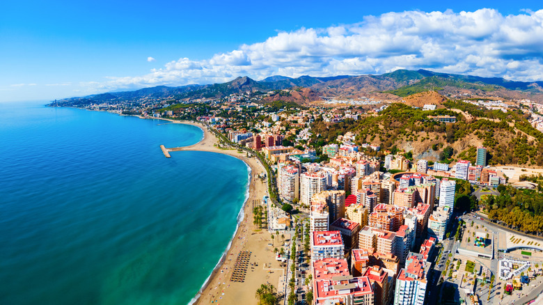 Skyscrapers rise over the beaches of Malaga
