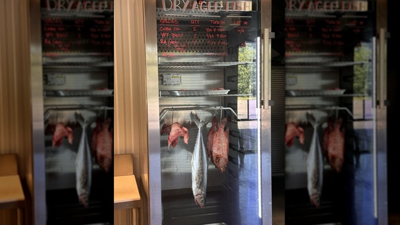 Dry aged fish hanging at Locals Seafood, one of the 5 best fresh seafood markets in all of North Carolina