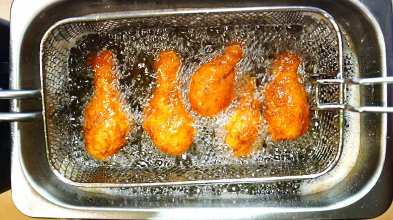 Chicken legs deep-fried in basket