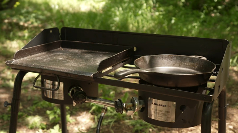 Camp Chef set up with pan and griddle outside