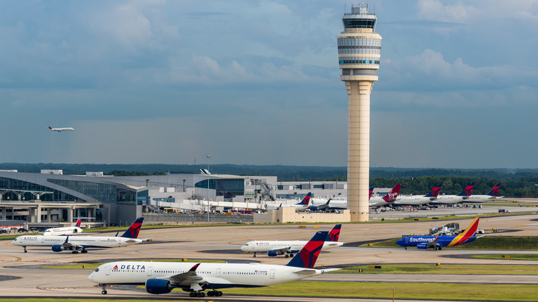 Planes and the control tower at the Atlanta airport