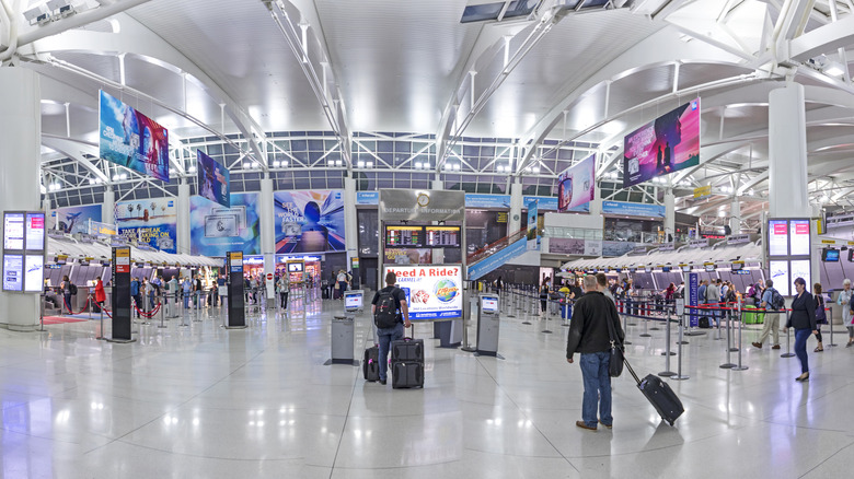 Travelers in JFK Airport's arrivals terminal