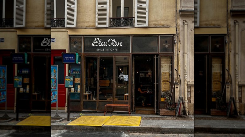 Exterior of the Bleu Olive cafe in Paris