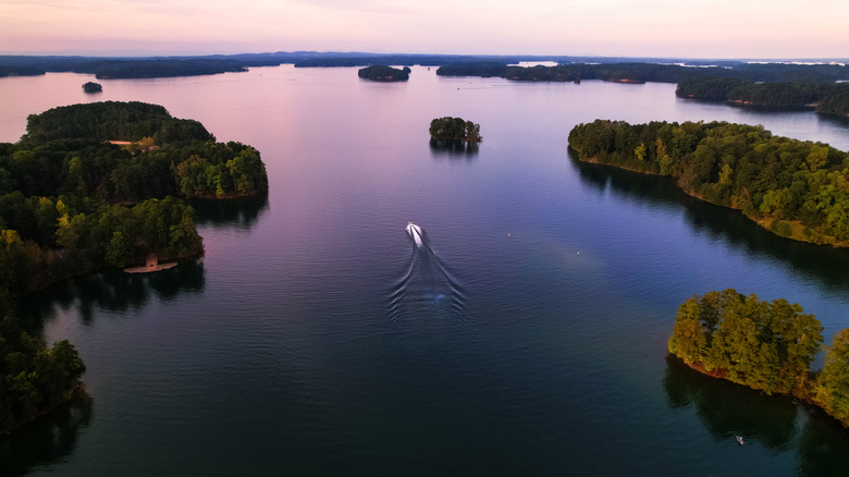 A boat on Lake Lanier at sunset