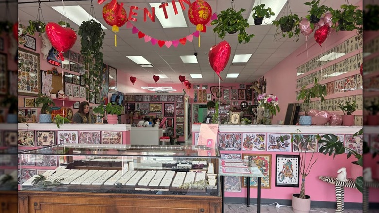 The bubblegum-pink and hearts-themed interior of Valentine Tattoo in Asheville, NC