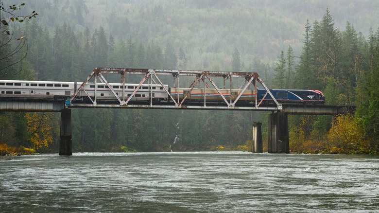 The Empire Builder train crosses a trestle bridge in the Pacific Northwest.