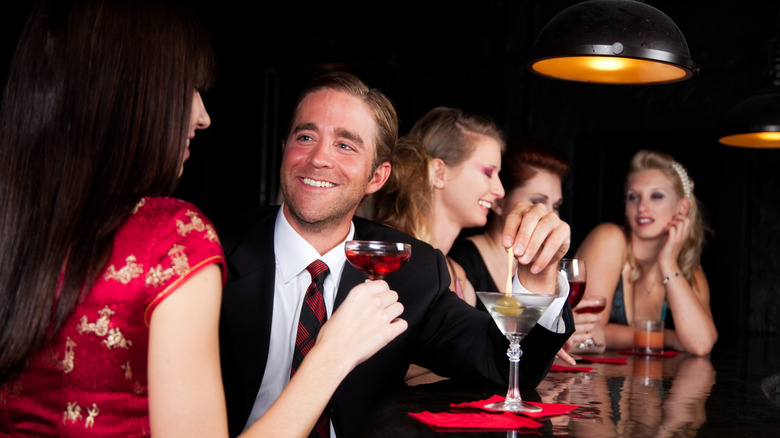 A group of young people at a bar