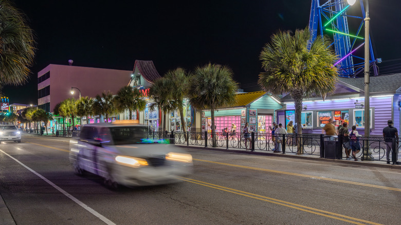 A line of bars and restaurants downtown at Myrtle Beach at night