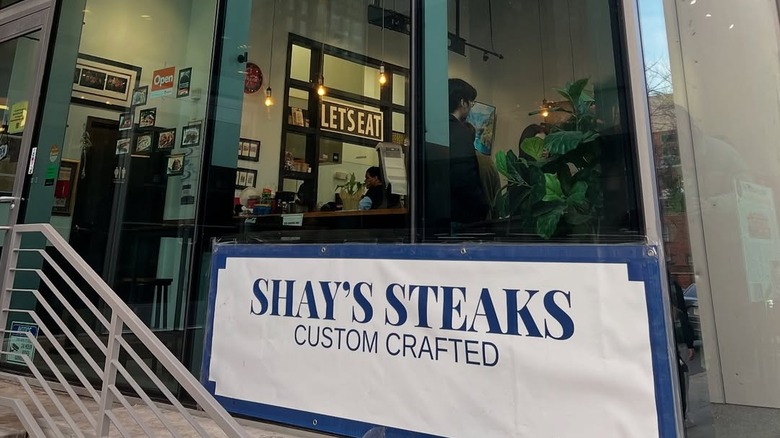 Shay's Steaks storefront through window in Philadelphia