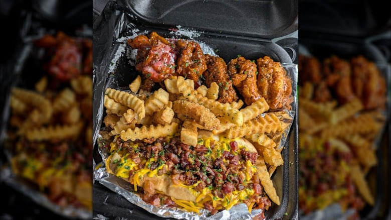 A box of wings and french fries from The Bando