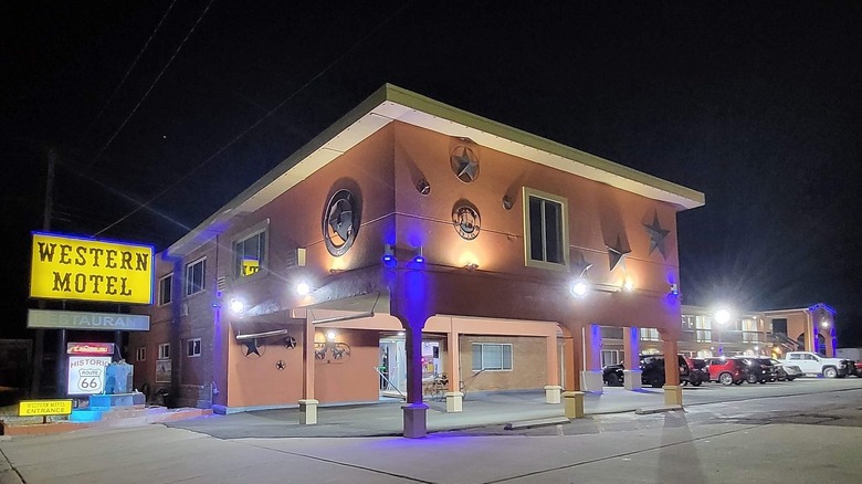 Exterior of the Western Motel at night in Shamrock, Texas