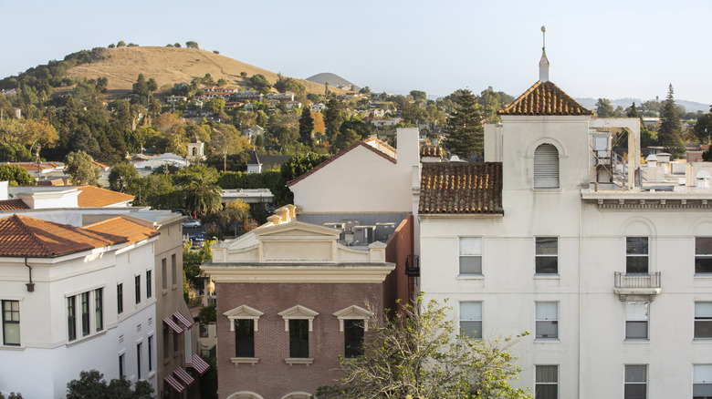 Hills rise behind historic buildings in San Luis Obispo