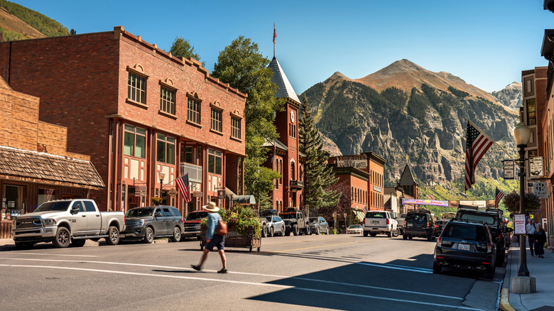 A person walks across the street in Telluride