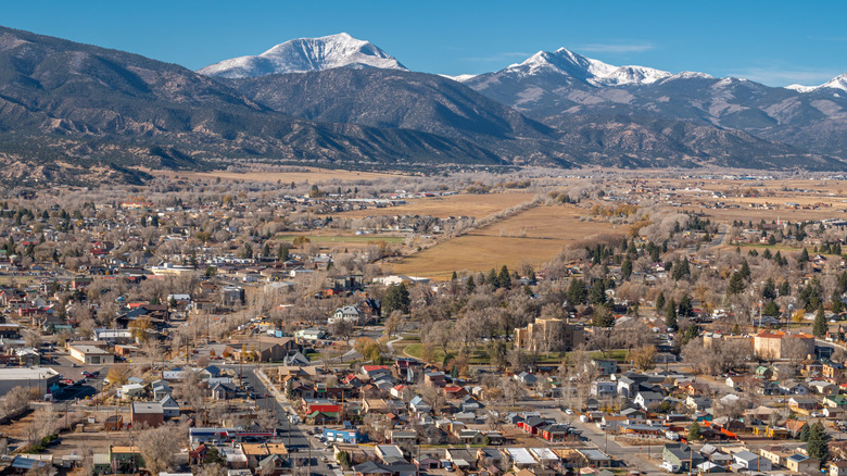 The Rocky Mountains on the horizon behind the town of Salida