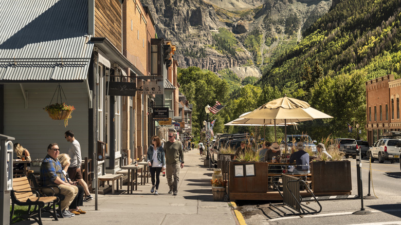 Cafes and bars line the sidewalk in Telluride