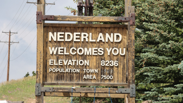 A sign welcomes visitors to Nederland, Colorado