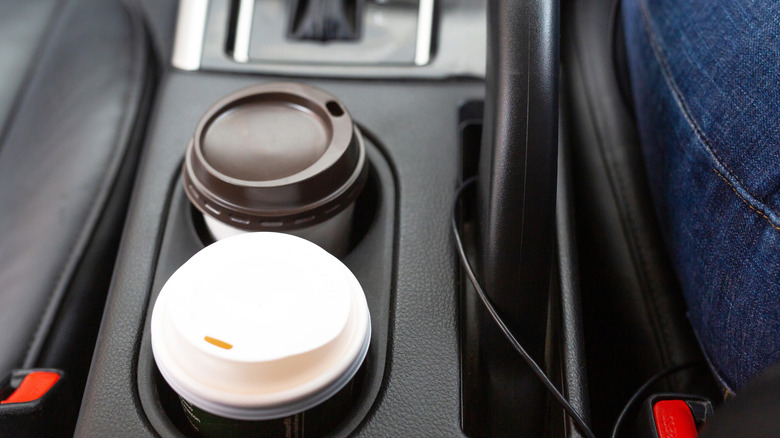 Car cupholder with two cups in it