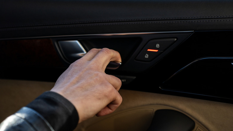 Passenger pulling interior door handle