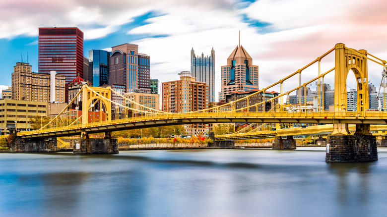 The yellow Rachel Carson bridge leading into Pittsburgh
