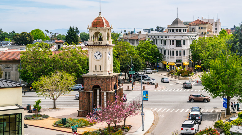 The sun shining on the town clock in Santa Cruz, California.