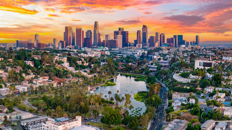 Aerial view of Downtown Los Angeles with orange-colored clouds