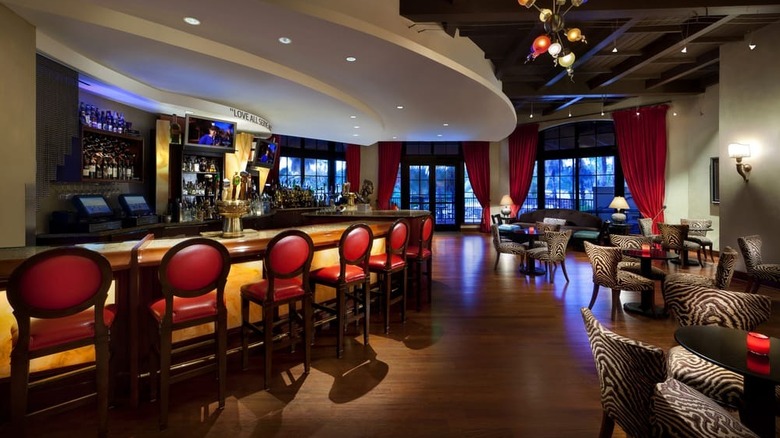 The interior of the Velvet Bar, showing zebra-print chairs and a long bar