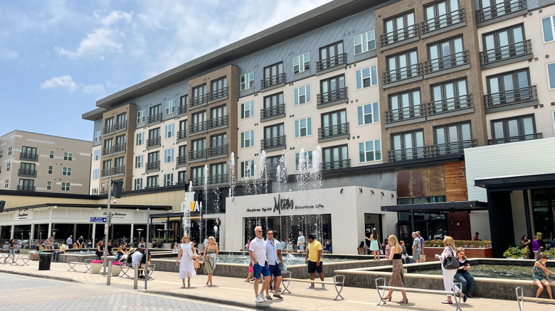 Local residents walking down a street in Plano, TX