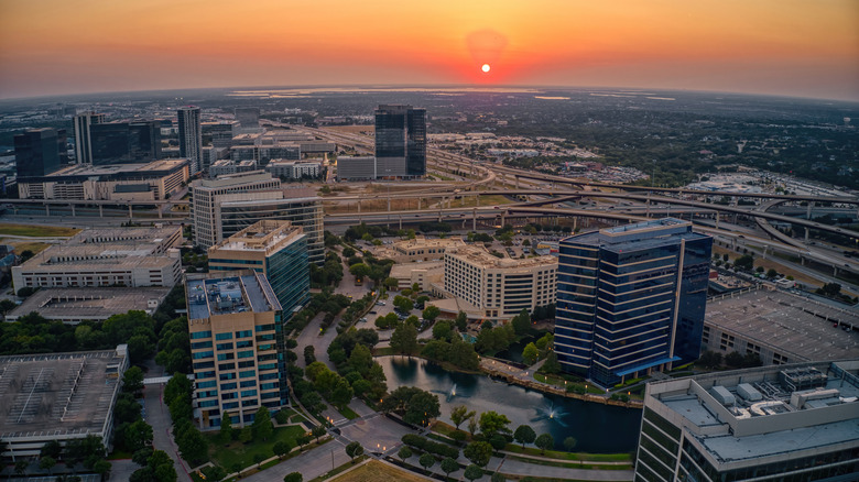 An aerial view of downtown Plano, TX at sunset