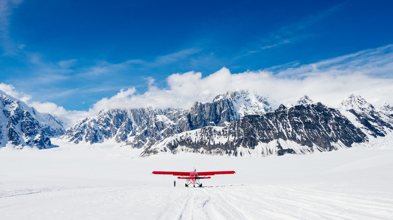 Plane takes off from snow in Denali National Park, Alaska