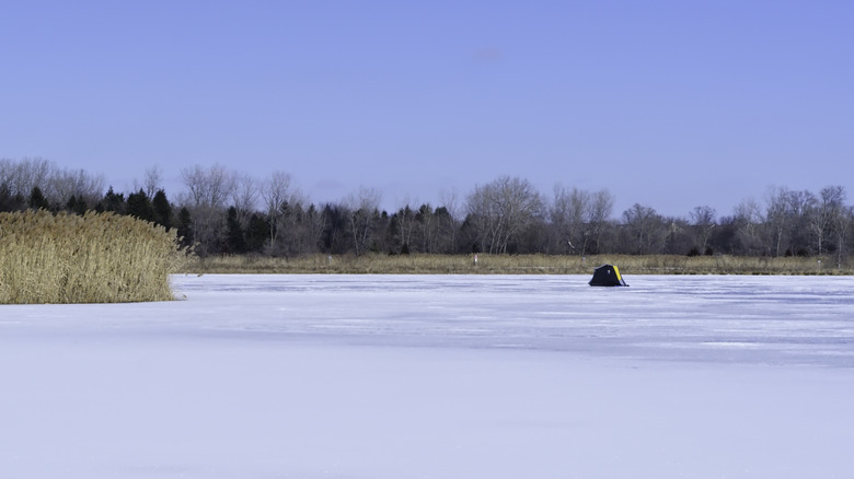 An ice fishing tent on a frozen lake in Illinois