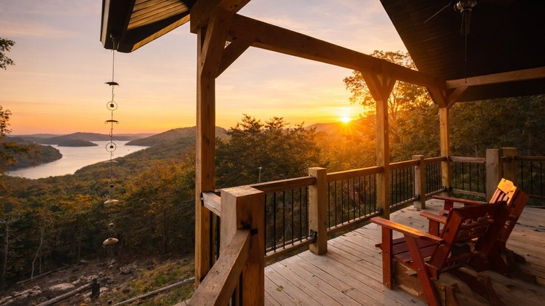 two chairs on the balcony of Sunrise Cabin, with gorgeous views of Table Rock Lake below