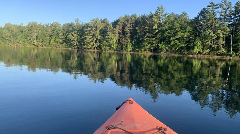 Kayaking in the calm, reflective water of Crystal Lake, Wisconsin