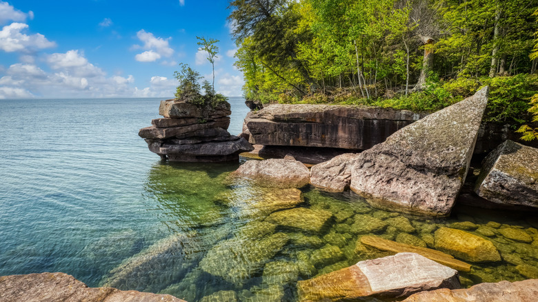 Clear waters on a rocky shoreline of Lake Superior in Wisconsin