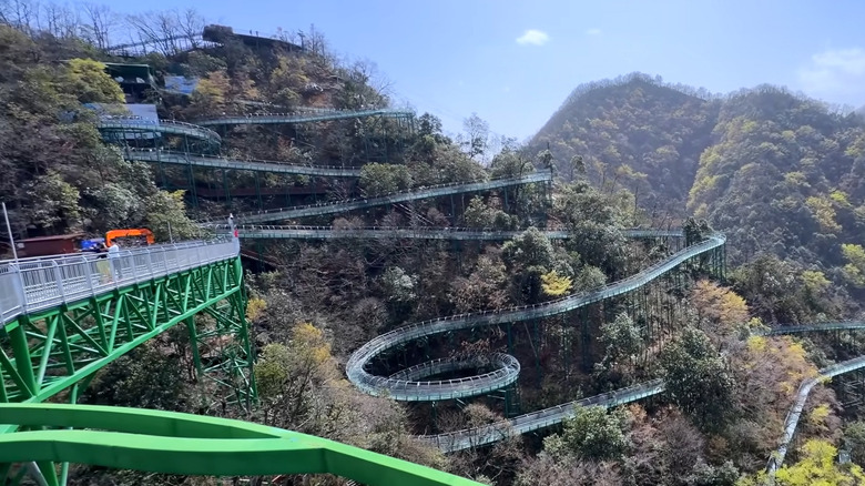 Water slide zigzagging down the mountain in Guangwushan Scenic Area, China