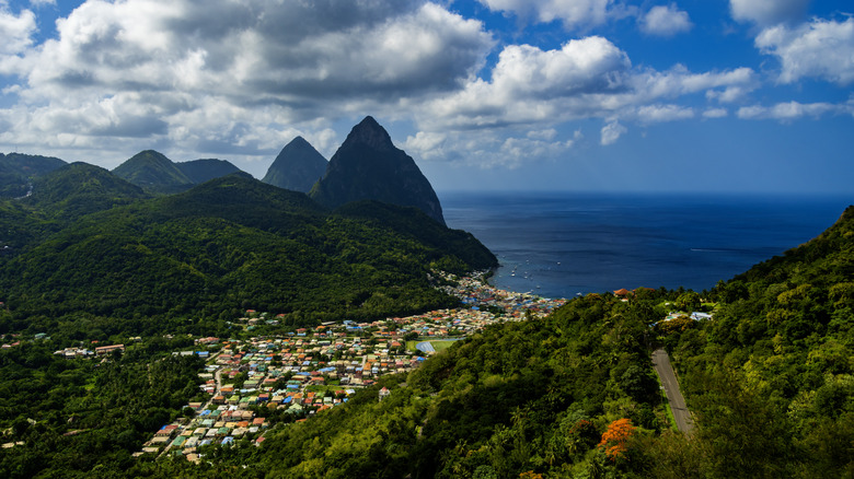Lush green forests and mountainous region around Petit Piton and Gros Piton of St Lucia in the Caribbean Sea