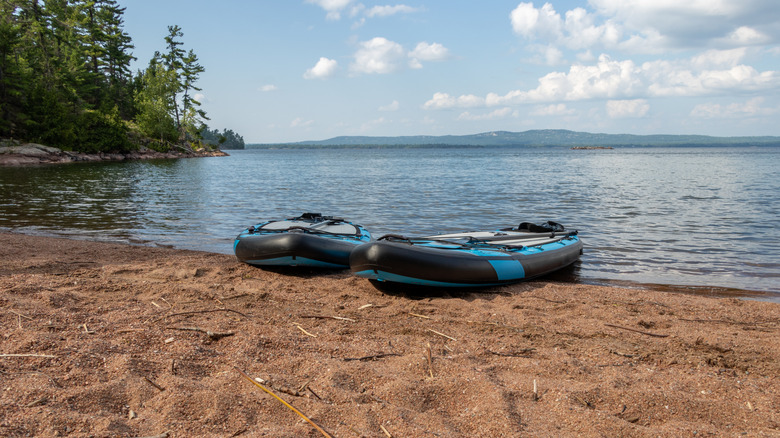 Paddleboards on a sandy beach at Croker Island in the North Channel, Algoma, Ontario, Canada