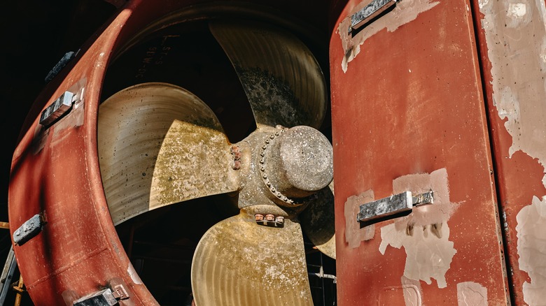 Close up of a ship's rudder and variable pitch propeller in dry dock